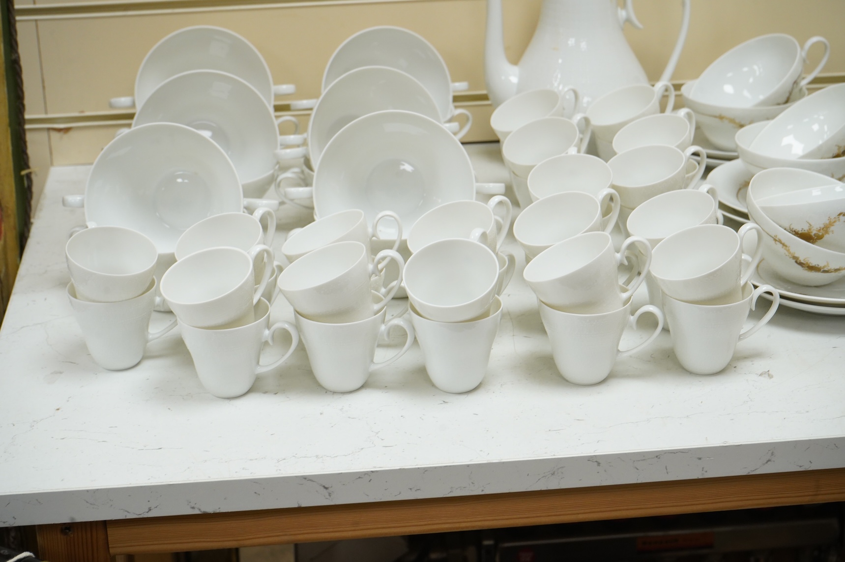 A Rosenthal studio line gilt decorated tea and coffee set to include cups and saucers, tea and coffee pot and side plates